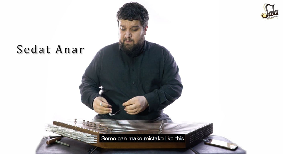 Correct grip and technique for holding santoor mezrab striking mallets